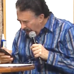 Preacher Stops To Check His Phone While Speaking In Tongues